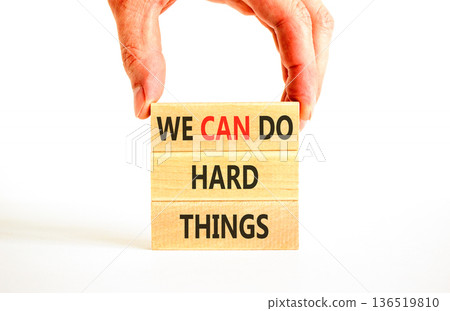 Support, help we can do hard things symbol. Concept words We can do hard things on beautiful wooden blocks. Beautiful white background. Business we can do hard things concept. Copy space. Support, help we can do hard things symbol. Concept words We can do hard things on beautiful wooden blocks. Beautiful white background. Business we can do hard things concept. Copy space. 136519810