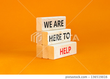 Support, help and we are here to help symbol. Concept words We are here to help on beautiful wooden blocks. Beautiful orange background. Business we are here to help concept. Copy space. Support, help and we are here to help symbol. Concept words We are here to help on beautiful wooden blocks. Beautiful orange background. Business we are here to help concept. Copy space. 136519816