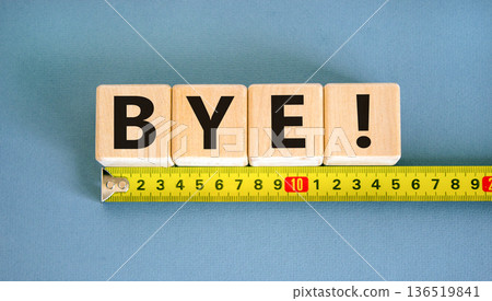 Bye symbol. Concept word Bye on beautiful wooden blocks. Beautiful yellow ruler. Beautiful blue table blue background. Business and bye concept. Copy space. Bye symbol. Concept word Bye on beautiful wooden blocks. Beautiful yellow ruler. Beautiful blue table blue background. Business and bye concept. Copy space. 136519841