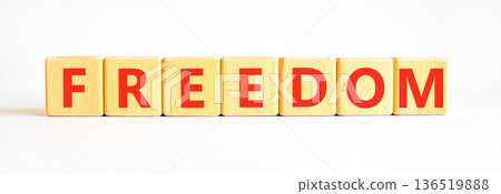 Freedom support symbol. Concept word Freedom on beautiful wooden blocks. Beautiful white background. Business freedom support concept. Copy space. 136519888