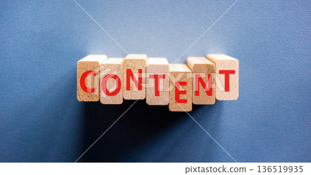 Content symbol. Concept word Content on beautiful wooden blocks. Beautiful blue background. Business content concept. Copy space. Content symbol. Concept word Content on beautiful wooden blocks. Beautiful blue background. Business content concept. Copy space. 136519935