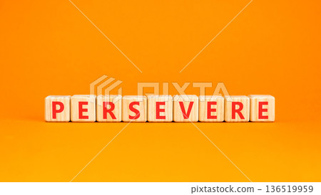 Persevere symbol. Concept word Persevere on beautiful wooden blocks. Beautiful orange background. Business education support persevere concept. Copy space. 136519959