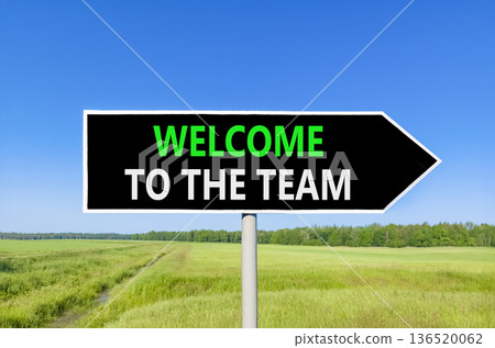 Support, help welcome to the team symbol. Concept words Welcome to the team on beautiful black road sign. Beautiful blue sky green field background. Business welcome to the team concept. Copy space. Support, help welcome to the team symbol. Concept words Welcome to the team on beautiful black road sign. Beautiful blue sky green field background. Business welcome to the team concept. Copy space. 136520062