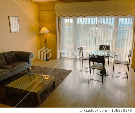 Ocean view hotel room living and dining area Ocean view hotel room living and dining area 136520178