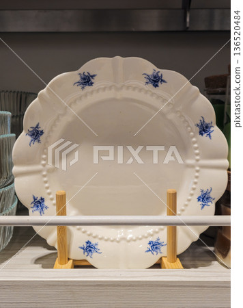 White Plates with Blue Pattern on Store Shelf White Plates with Blue Pattern on Store Shelf 136520484