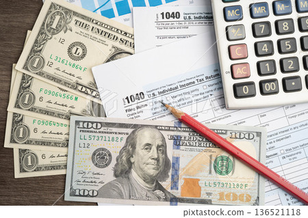Bangkok, Thailand - May 15, 2022 Tax form 1040 U.S. Individual Income Tax Return, business finance. Bangkok, Thailand - May 15, 2022 Tax form 1040 U.S. Individual Income Tax Return, business finance. 136521118