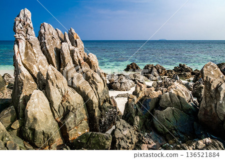 sharp rocks on the seashore 136521884