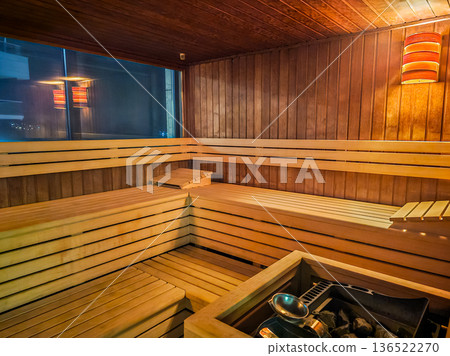 Wooden Sauna Benches and Stove Interior Wooden Sauna Benches and Stove Interior 136522270