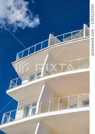 balconies of hotel against background of the blue sky balconies of hotel against background of the blue sky 136522504