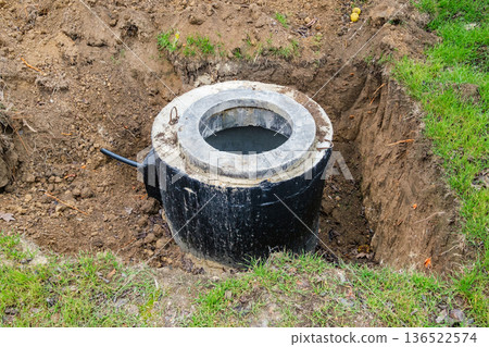 concrete sewer well at the construction site 136522574