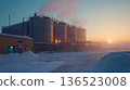 Industrial oil refinery in winter at sunrise with snow and steam 136523008