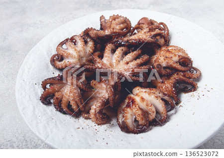 Baby octopus grilled on a white plate, homemade, no people, 136523072
