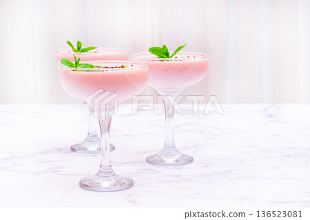 fruit mousse, made from jelly and cottage cheese, in glasses, decorated with sprinkles and mint, homemade fruit mousse, made from jelly and cottage cheese, in glasses, decorated with sprinkles and mint, homemade 136523081