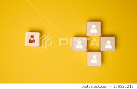 Wooden cubes with staff icons. Concepts of leadership, individuality 136523212