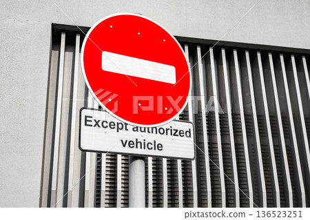 road sign forbidding entry, except authorized vehicle road sign forbidding entry, except authorized vehicle 136523251
