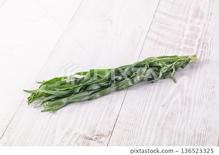 Fresh green estragon aroma stem 136523325