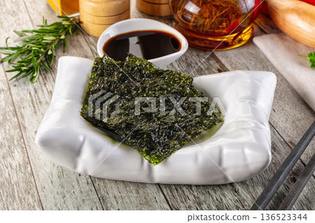 Seaweed roasted nori chips heap Seaweed roasted nori chips heap 136523344