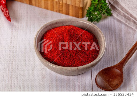 Red dry chili pepper paprika powder Red dry chili pepper paprika powder 136523434