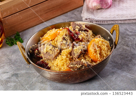 Traditional couscous with lamb and vegetables 136523443