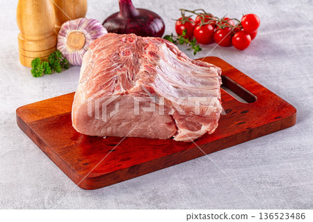 Raw pork loin with bone Raw pork loin with bone 136523486