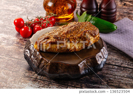 Baked chicken breast with spices and herbs Baked chicken breast with spices and herbs 136523504