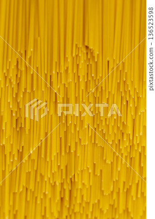 made from durum wheat and water long thin yellow spaghetti, long pasta with a round cross-section made from quality wheat grains made from durum wheat and water long thin yellow spaghetti, long pasta with a round cross-section made from quality wheat grains 136523598