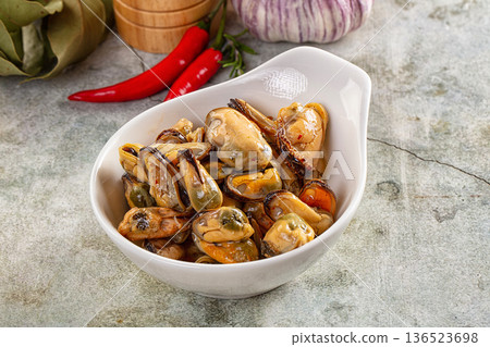 Canned mussels in oil and spices 136523698
