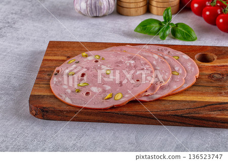 Italian mortadella pork sausages slices Italian mortadella pork sausages slices 136523747
