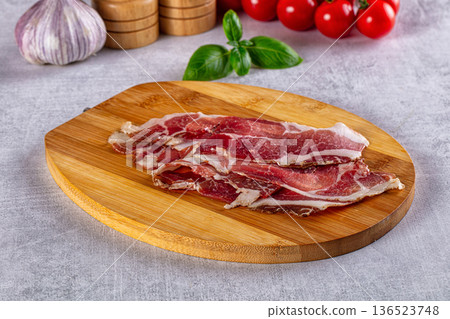Cured pork Spanish jamon slices Cured pork Spanish jamon slices 136523748