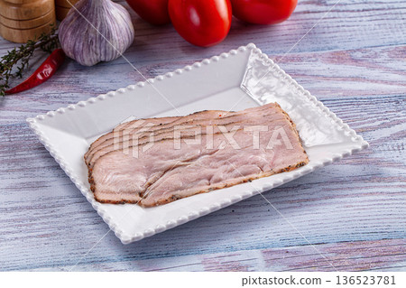 Sliced Pastrami meat fillet with spices 136523781