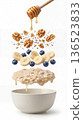 Infographic image of a layered breakfast, with oatmeal, fruit, and nuts. Healthy meal concept 136523833