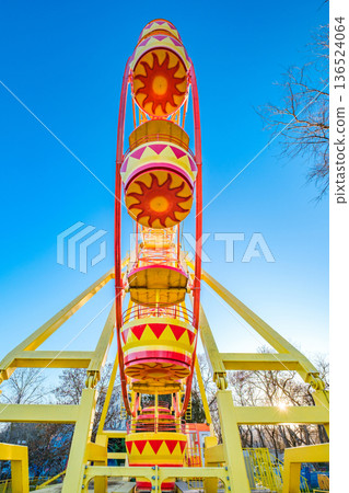 ferris wheel attraction, view from the end ferris wheel attraction, view from the end 136524064