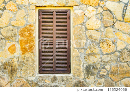 window with shutters on wall of house window with shutters on wall of house 136524066