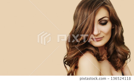 Glamorous Woman With Long Wavy Hair, Fashion Model, Soft Smile, Voluminous Brunette Curls Hairstyle, Flawless Evening Smokey Eyes Makeup, Elegant Gaze. Beauty Style Portrait on Beige, Cosmetic Glamorous Woman With Long Wavy Hair, Fashion Model, Soft Smile, Voluminous Brunette Curls Hairstyle, Flawless Evening Smokey Eyes Makeup, Elegant Gaze. Beauty Style Portrait on Beige, Cosmetic 136524118