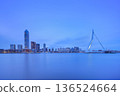 Long exposure of Erasmus Bridge in Rotterdam at twilight. City and the Maas river. 136524664