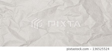 Crumpled white paper surface with wrinkled texture background 136525524
