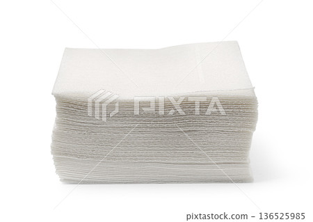 Stack of white disposable paper napkins creating hygiene concept Stack of white disposable paper napkins creating hygiene concept 136525985