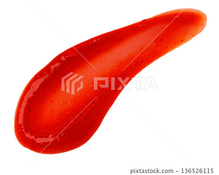 Red sauce splatter creating abstract liquid stain 136526115