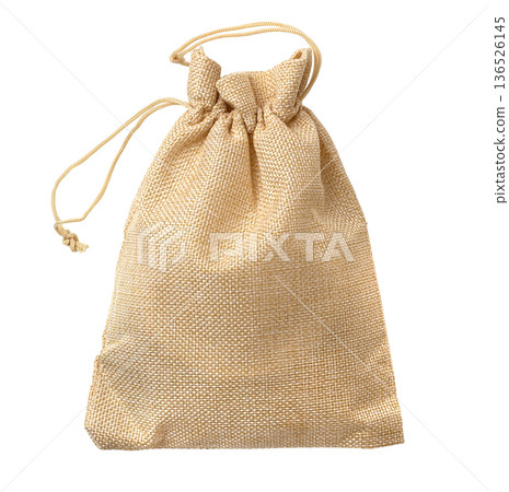 Burlap sack pouch with drawstring closure isolated Burlap sack pouch with drawstring closure isolated 136526145