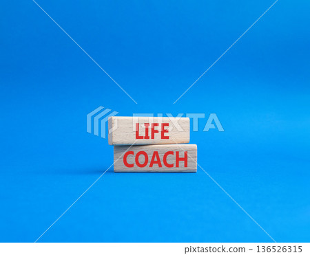 Life Coach symbol. Concept word Life Coach on wooden blocks. Beautiful blue background. Business and Life Coach concept. Copy space Life Coach symbol. Concept word Life Coach on wooden blocks. Beautiful blue background. Business and Life Coach concept. Copy space 136526315
