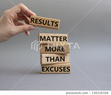 Results symbol. Wooden blocks with words Results Matter More Than Excuses. Businessman hand. Beautiful grey background. Business and Results concept. Copy space 136526388