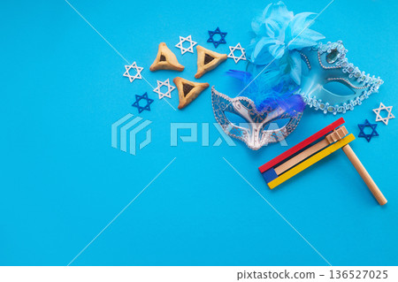 Purim celebration items on blue background Purim celebration items on blue background 136527025