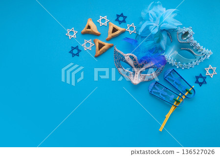 Purim celebration items on blue background Purim celebration items on blue background 136527026
