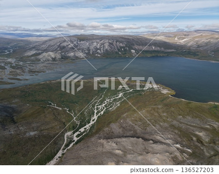 Aerial view Chukotka Arctic coastline pristine tundra wilderness landscape Aerial view Chukotka Arctic coastline pristine tundra wilderness landscape 136527203