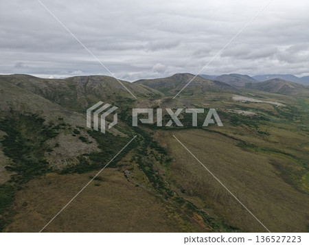 Aerial view Lavrentiya bay Bering waters remote coastal terrain landscape Aerial view Lavrentiya bay Bering waters remote coastal terrain landscape 136527223