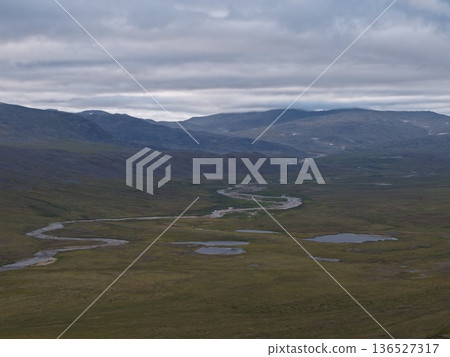Aerial view Lavrentiya bay Bering waters remote coastal terrain landscape 136527317