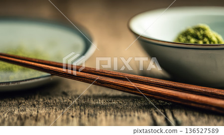 Chopsticks Close-Up: Japanese Kitchen Essentials, Natural Wood Texture, Wasabi Bowl 136527589