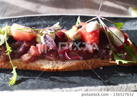 Seared Tuna Tataki Sliced and Served Seared Tuna Tataki Sliced and Served 136527632