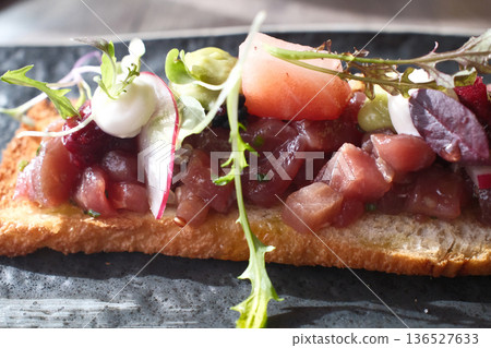 Seared Tuna Tataki Sliced and Served Seared Tuna Tataki Sliced and Served 136527633
