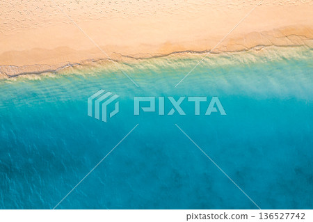 Serene calm relax aerial beach pristine ocean blue waves tropical copy space Serene calm relax aerial beach pristine ocean blue waves tropical copy space 136527742